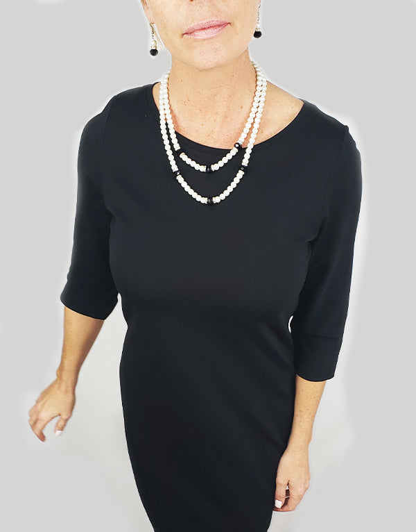 Ensemble collier et boucles d'oreilles imitation perles