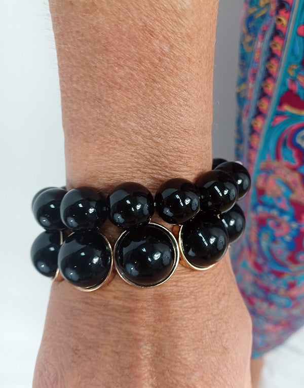 Bracelet black pearls and gold outline